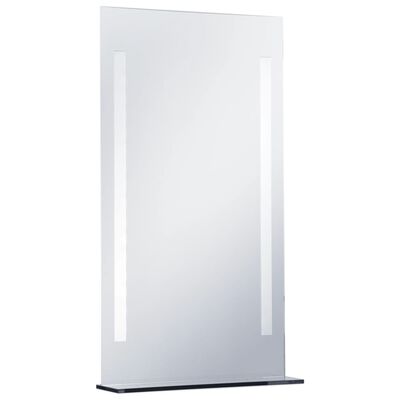 vidaXL LED-es fürdőszobai falitükör polccal 60 x 100 cm