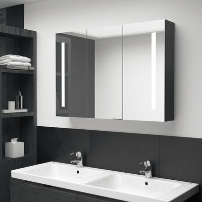 vidaXL fényes fekete fürdőszobaszekrény LED világítással 89x14x62 cm
