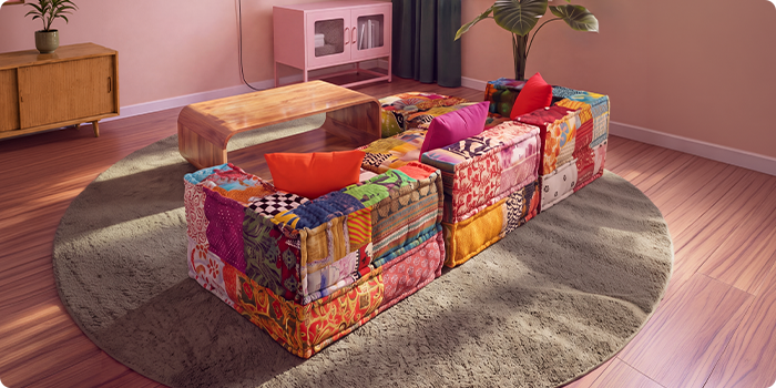 Színes patchwork moduláris kanapé fa dohányzóasztal köré rendezve, kerek szőnyegen, egy modern nappaliban.