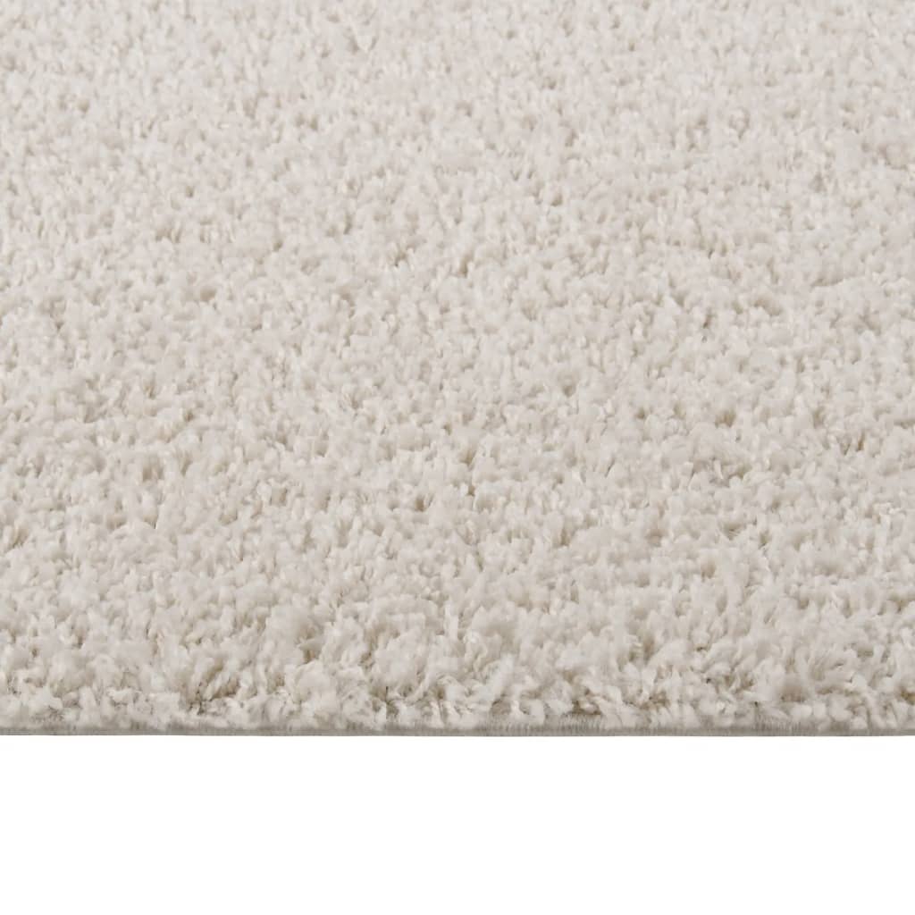 vidaXL krémszínű hosszú szálú bozontos szőnyeg 140x200 cm